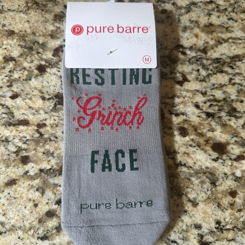 Pure Barre Gray and Green Grip Grinch Face Socks